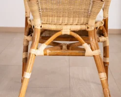 Meuble House Elégant petit fauteuil en rotin tressé avec assise tissu