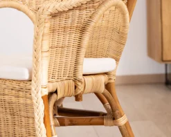 Meuble House Elégant petit fauteuil en rotin tressé avec assise tissu