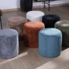 Meuble House Lot de 2 petits poufs ronds en velours couleur camel "Snaw"