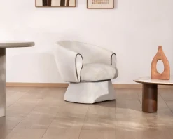 Meuble House Petit fauteuil lounge en tissu bouclette blanc cassé